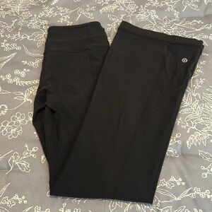 Black Lululemon Pants reversible with Striped Waistband on one side.